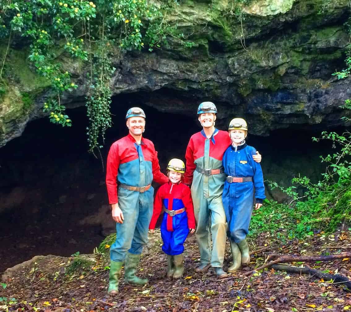 family caving experience - before descent in clean overalls